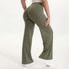 A person wearing olive green NCLAGEN SoftMotion straight leg yoga pants and a light top.