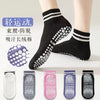A set of non-slip grip socks in various colors and patterns for yoga and pilates