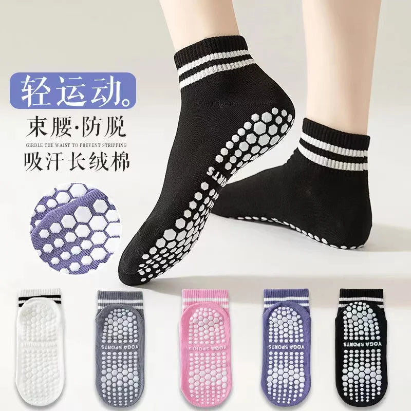 A set of non-slip grip socks in various colors and patterns for yoga and pilates