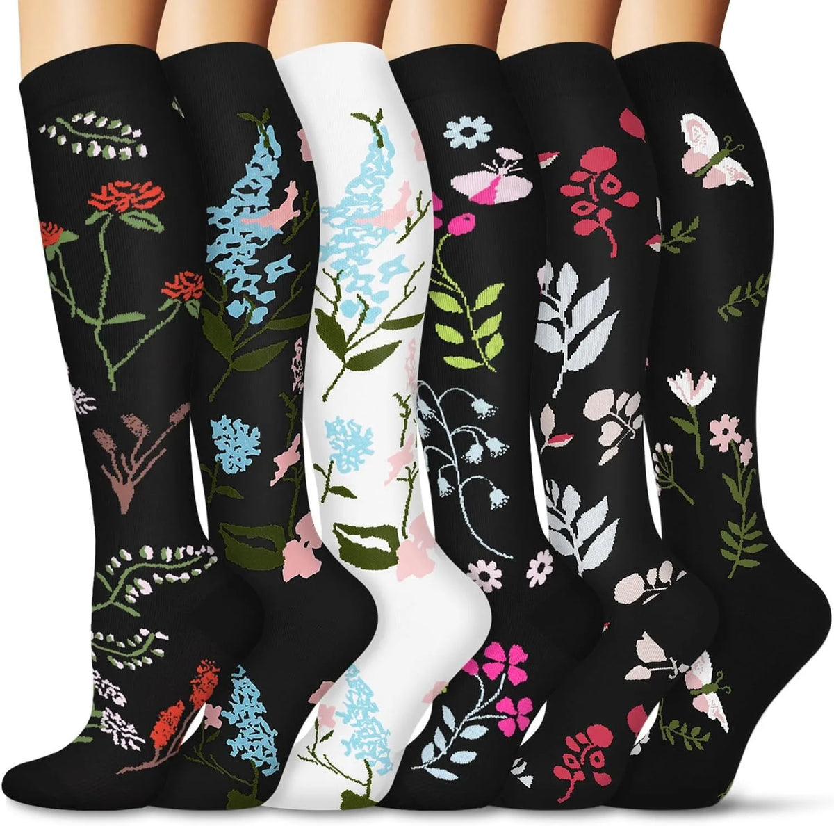 Ein Set von sechs floral gemusterten Kompressionsstrümpfen in verschiedenen Farben und Designs