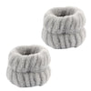 A pair of soft gray microfiber spa headband and wristband set.