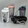 A set of three 600ml blender shaker bottles in various colors including white, purple, and blue/teal.