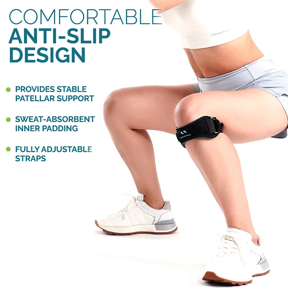 A person wearing a black anti-slip knee strap on their leg while standing and wearing athletic shoes.