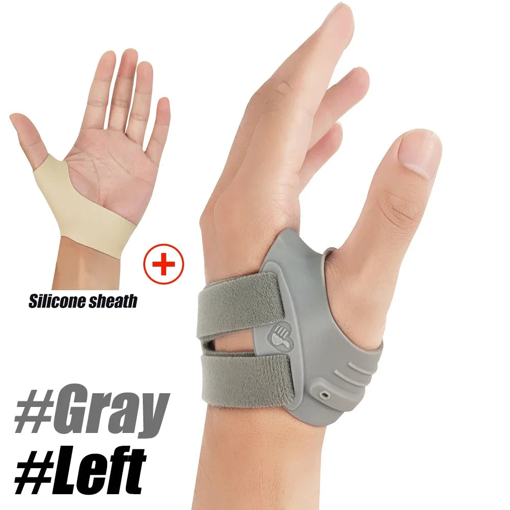 Gray silicone sheath thumb joint stabilizer brace worn on the left hand.