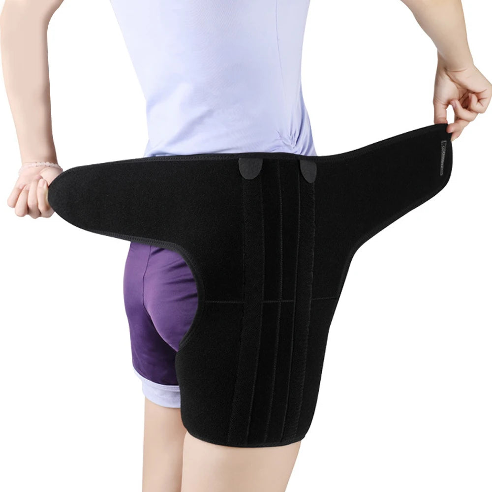 Black adjustable groin and thigh compression support brace worn by a person.