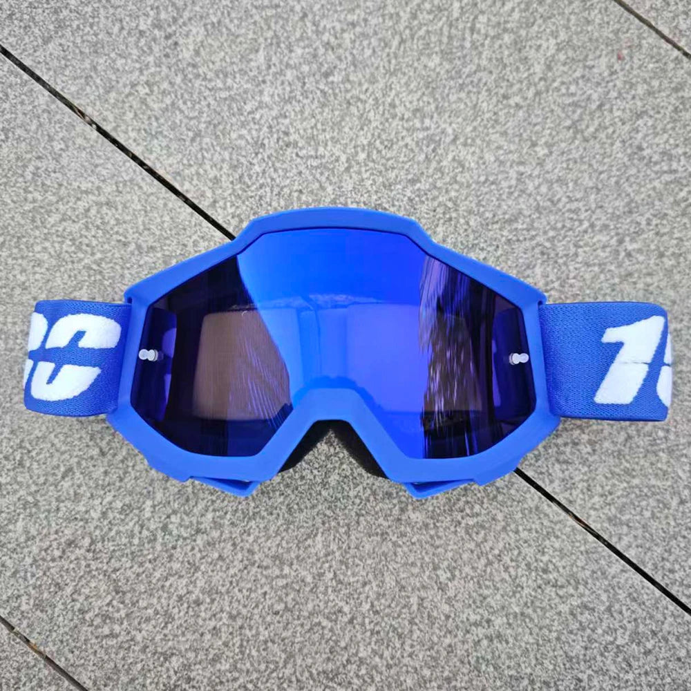Une paire de lunettes de moto tout-terrain et ATV bleu vif avec une marque blanche sur le côté.