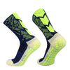 A pair of neon yellow and navy anti-slip training socks shown from the side.