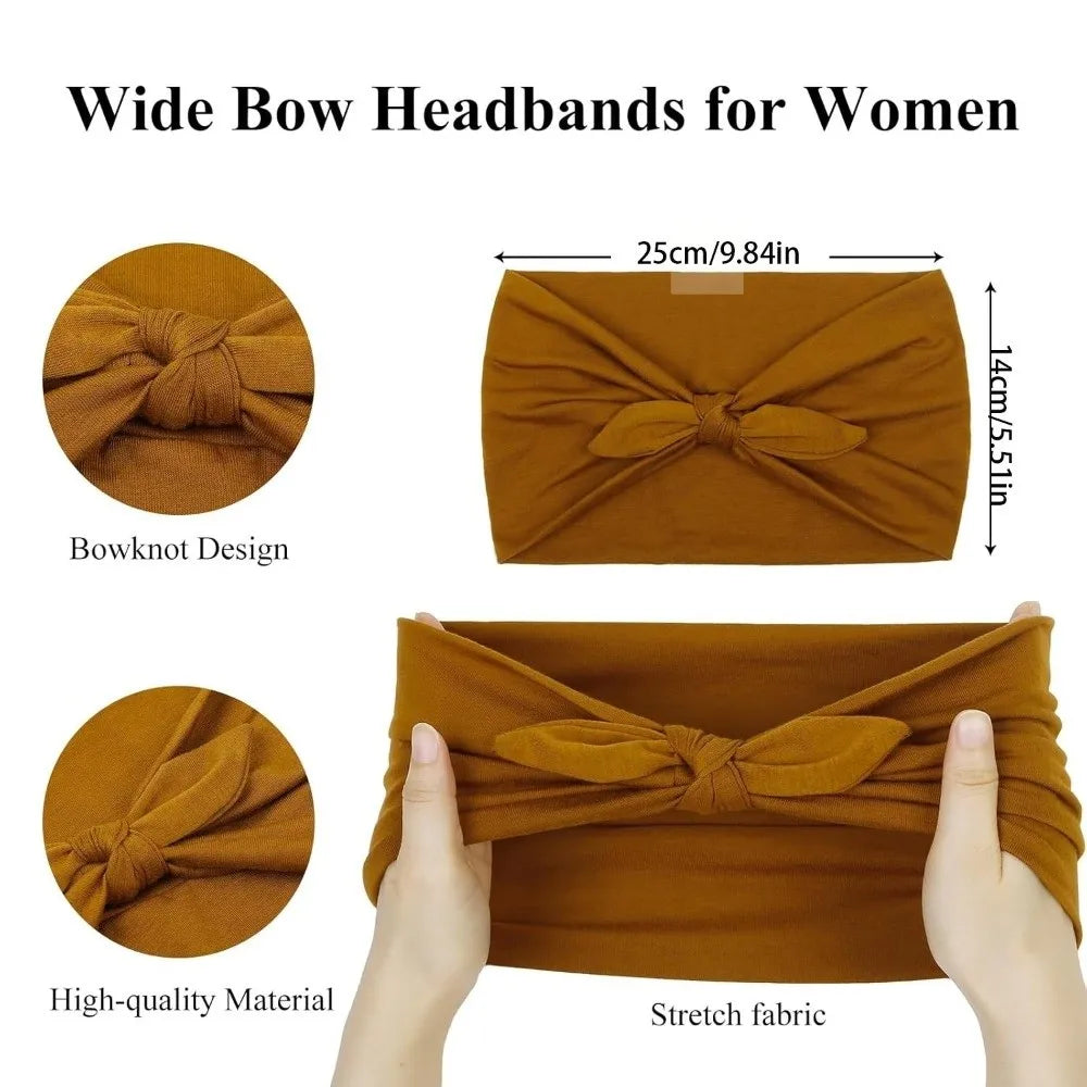 A close-up of a mustard yellow fabric headband with a bow knot design and stretch fabric texture.