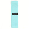 Light blue fabric resistance band for glute and leg workouts