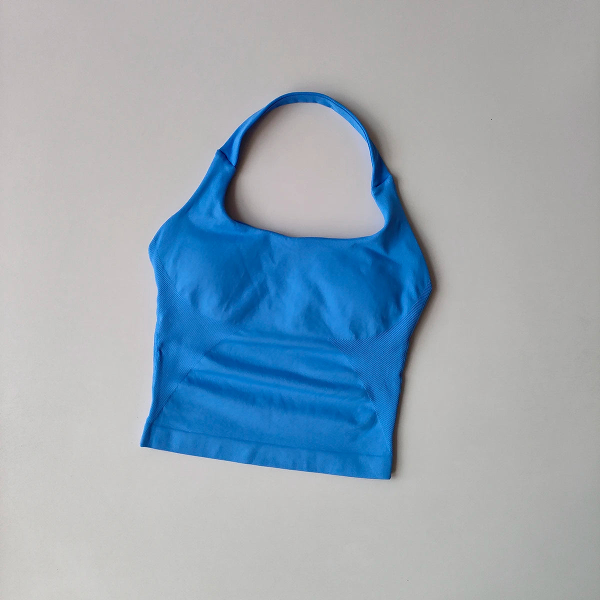 Haut sans coutures bleu vif pour femmes, à bretelles, pour yoga et fitness.