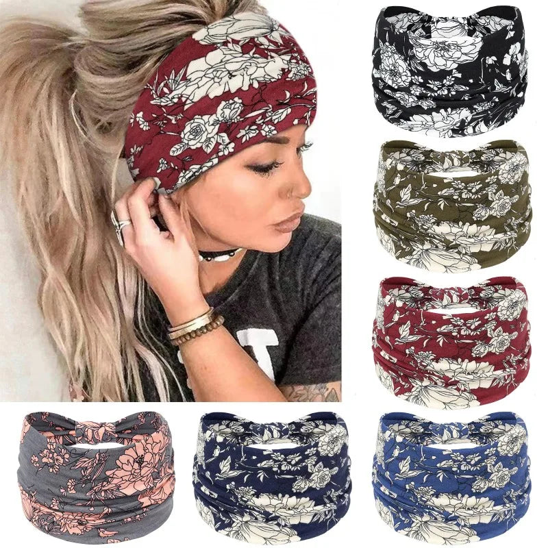 A collection of boho printed wide knotted headbands in various floral patterns and colors.