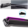 Close-up view of a black universal car wiper blade assembly and replacement parts.