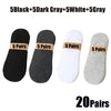 A collection of 20 pairs of breathable boat socks in black, dark gray, white, and gray colors.