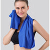 A woman wearing a blue instant cooling towel for sports and fitness.