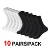 A pack of ten pairs of white and black knee-high performance socks laid out in a row.