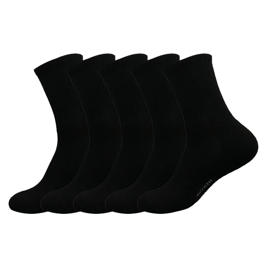A set of black men's essential warm socks stacked in a row.