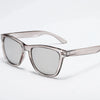Clear gradient mirrored sunglasses with a translucent pink frame shown against a white background.