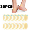 A set of 20 clear silicone blister patches for foot protection shown next to a bare foot.