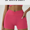 A model wearing a bright pink sports suit or high-waisted fitness leggings.