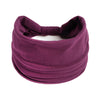 Un foulard en coton bohème violet foncé noué en nœud, présenté sur fond blanc.