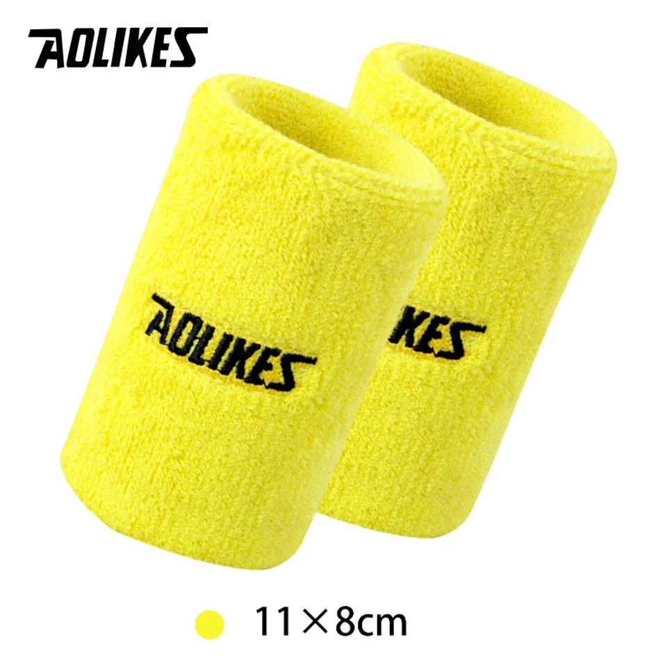 Yellow athletic wristbands with the AOLIKES logo, measuring 11x8cm.