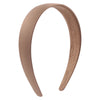 A beige satin hair band is shown in a curved shape against a white background.