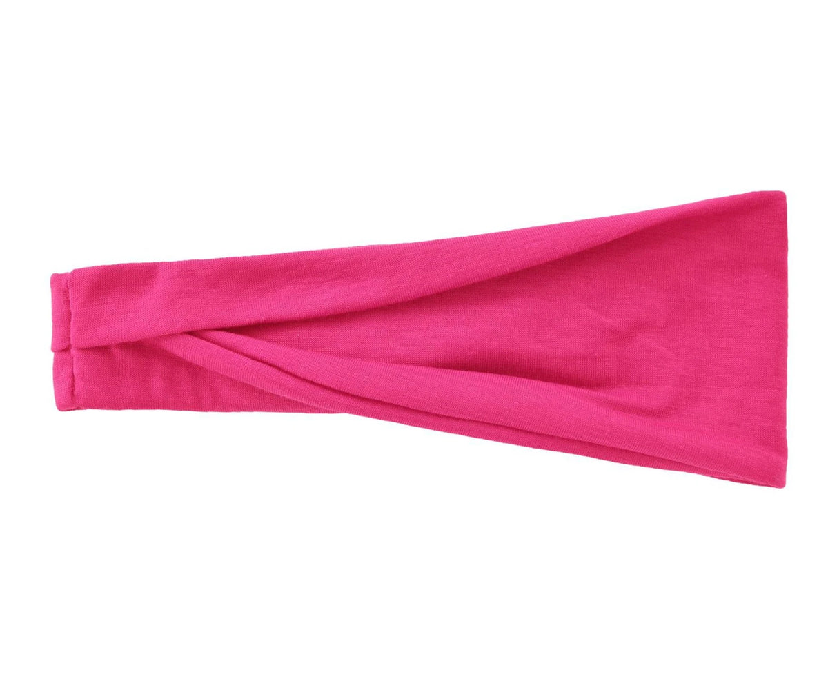 Un bandeau élastique rose vif plié et présenté sur un fond blanc.