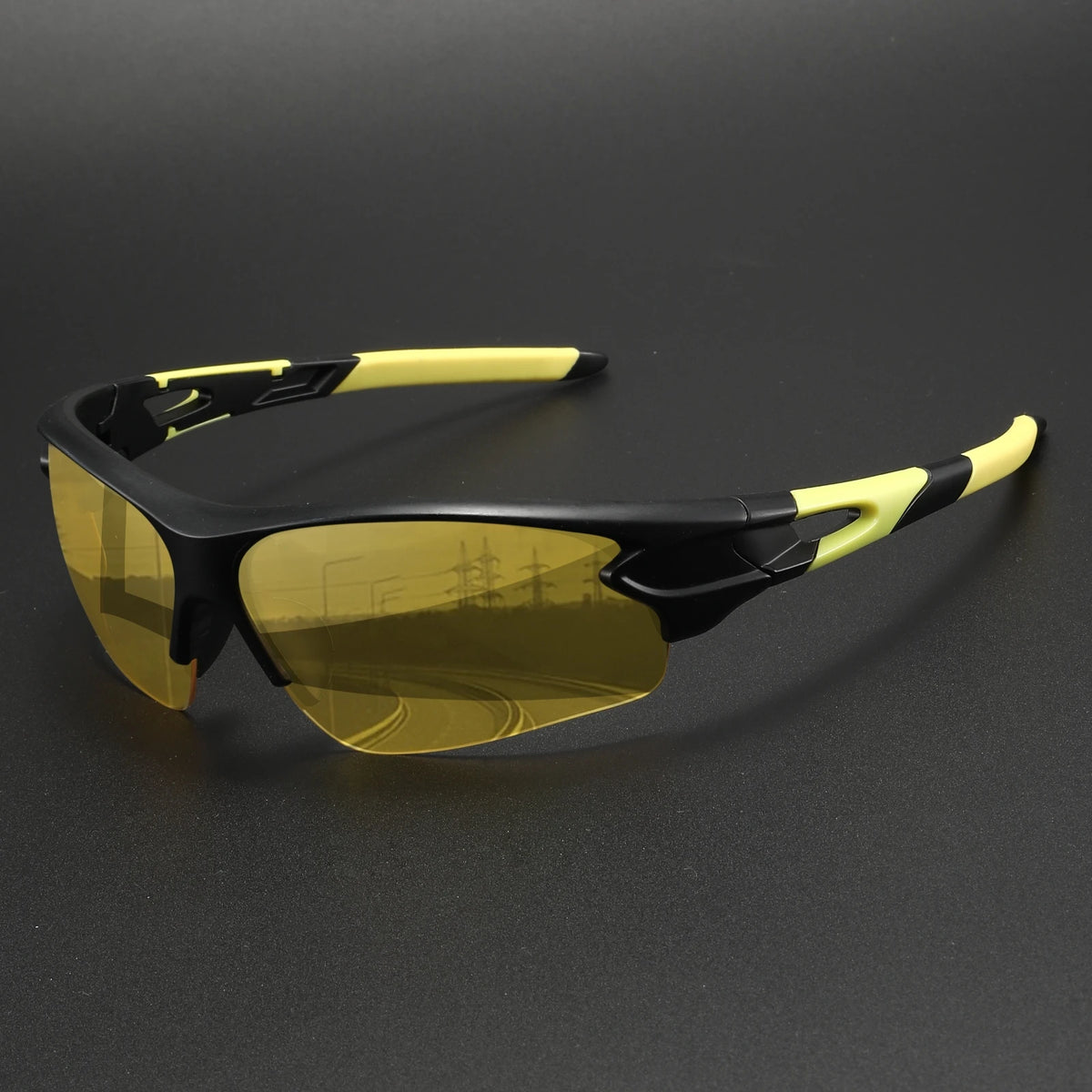 Black and yellow wraparound sports sunglasses with a yellow lens displayed on a dark background.