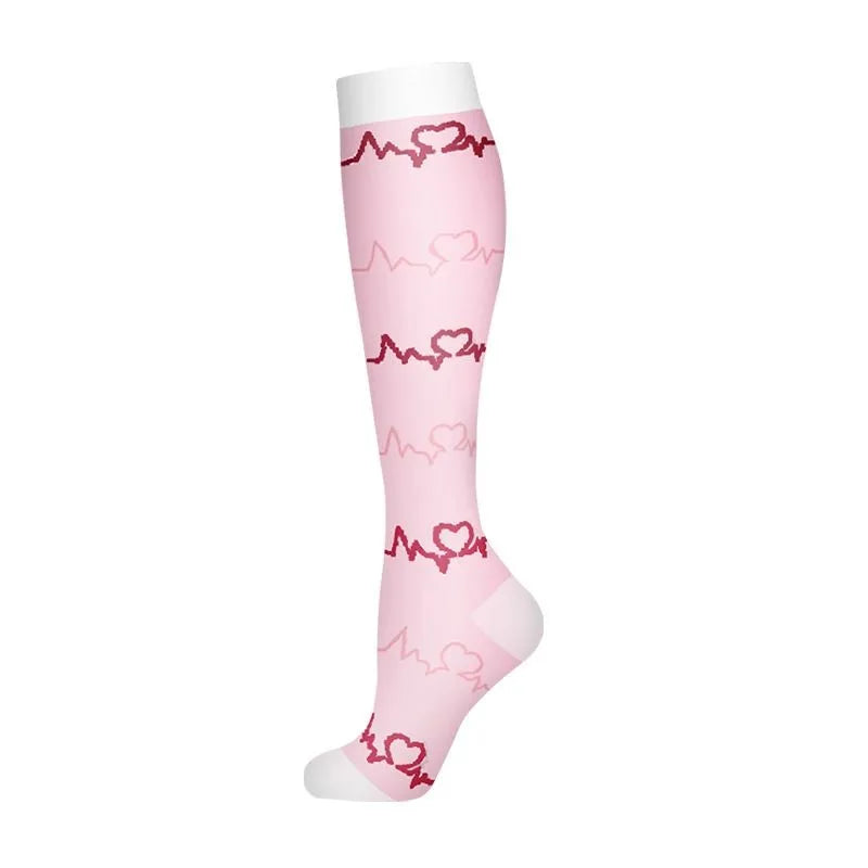 Pink compression socks with a heart pattern design