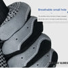 Close-up view of a gray microfiber golf glove showing the back of the finger design.