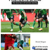 A soccer player wearing green and black uniform is shown playing on a field, demonstrating the cushioning protects shins.