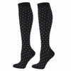 Pair of black compression elastic socks with a small white dot pattern
