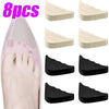 Eight pairs of adjustable EVA foot pads for heels and shoes shown in various shades of beige and black.
