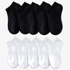A set of black and white thin ankle socks for athletic and daily wear.