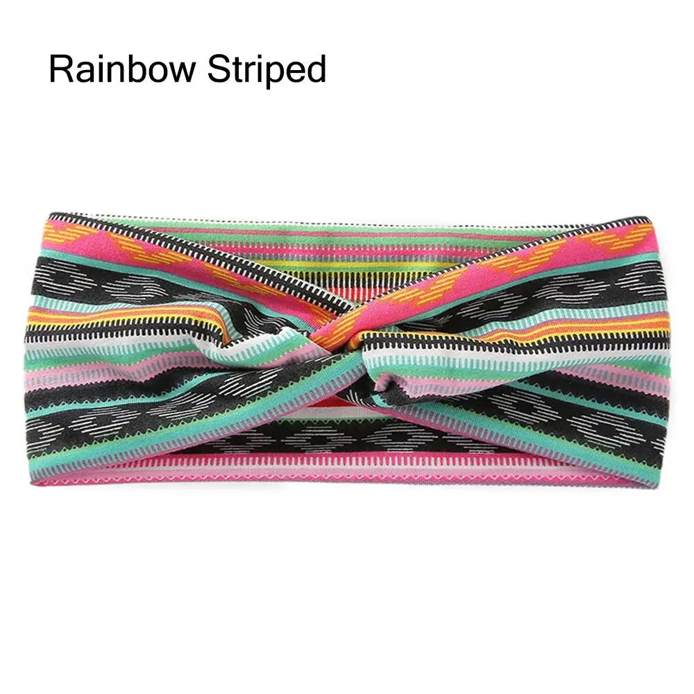 Diadema de tela elástica a rayas arcoíris con franjas horizontales multicolores.