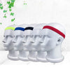 A row of five white sports headbands with colored bands (yellow, blue, black, red) displayed against a white background.