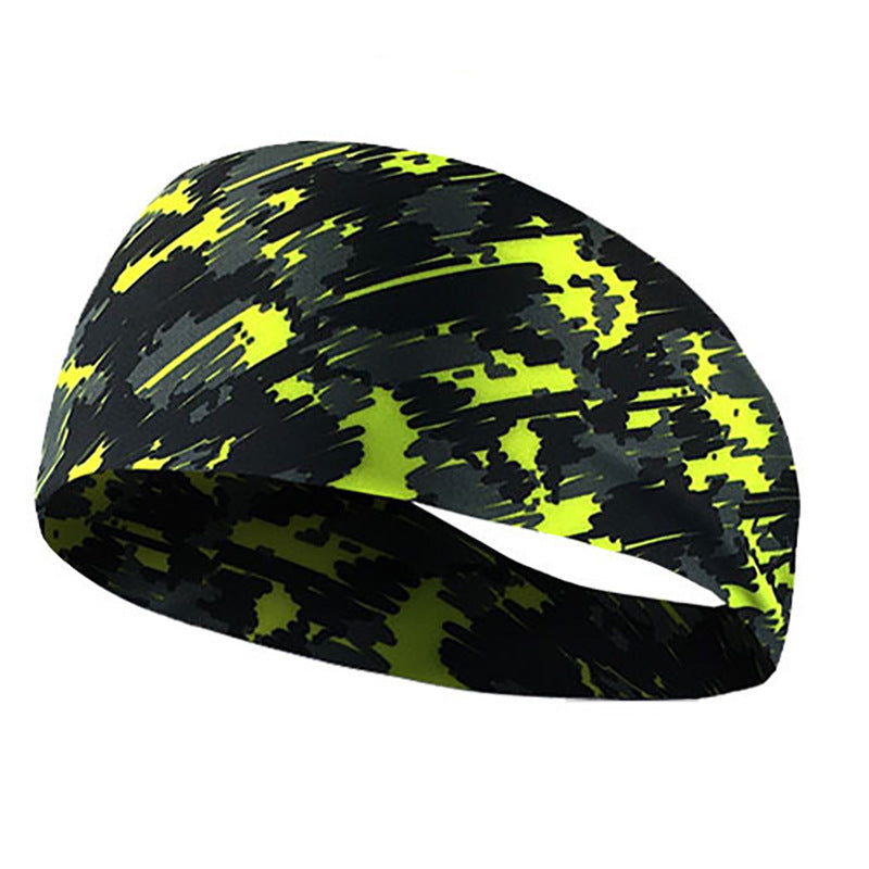 Black and neon yellow camouflage elastic sports headband worn on a wrist.