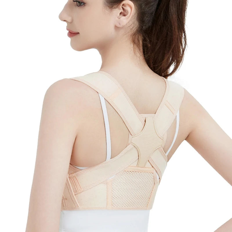 A woman wearing a beige adjustable posture corrector for back and shoulder support.