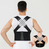 A man wearing a black adjustable posture back brace support on his torso.
