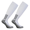 A pair of white professional training football socks with black dotted accents and gray heel and toe sections.