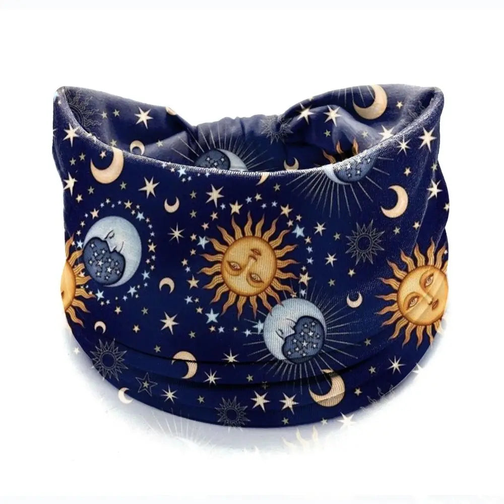 Large dark blue bohemian print hair wrap with celestial designs like moons and suns