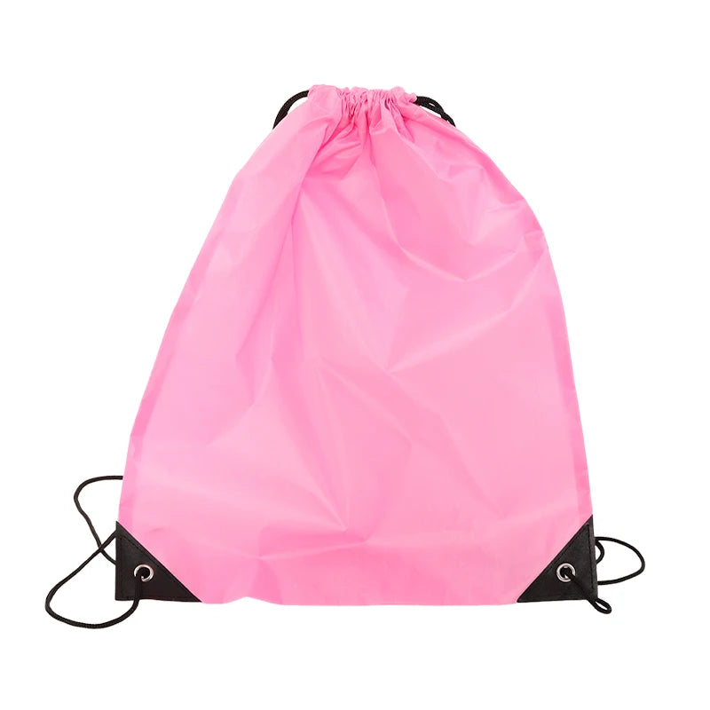 A bright pink durable nylon drawstring backpack shown from the front.