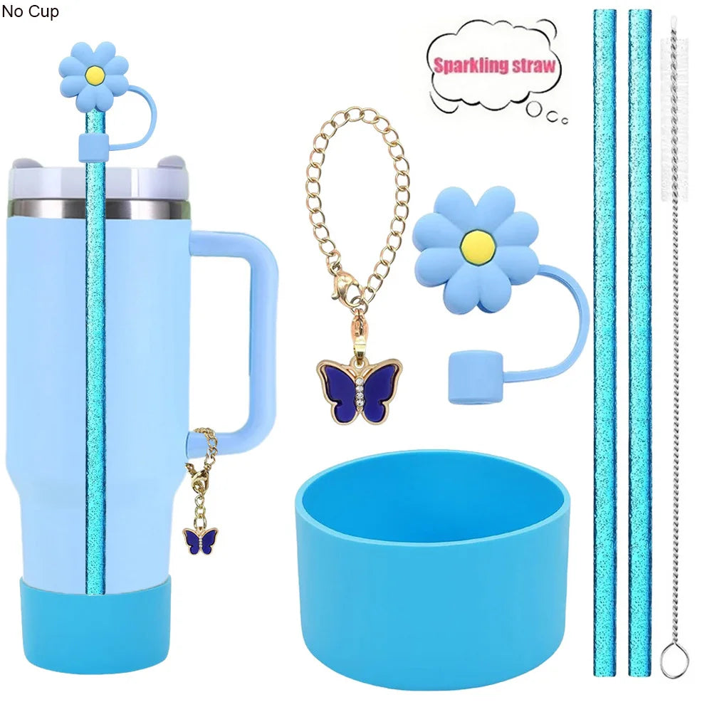 A set of six reusable accessories for a tumbler including a straw, charm, and silicone cup.