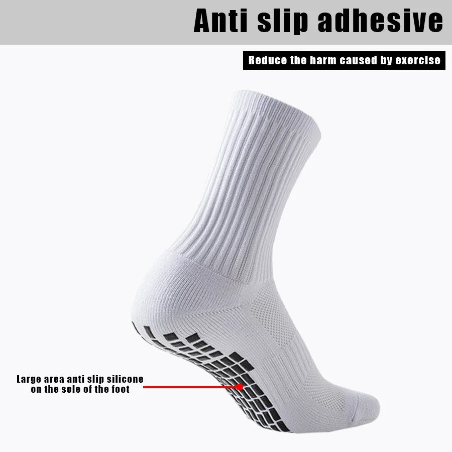 White athletic grip socks with anti-slip silicone on the sole of the foot