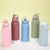 A set of five pink, blue, green, and light blue stainless steel vacuum flask water bottles with straws displayed on a white s