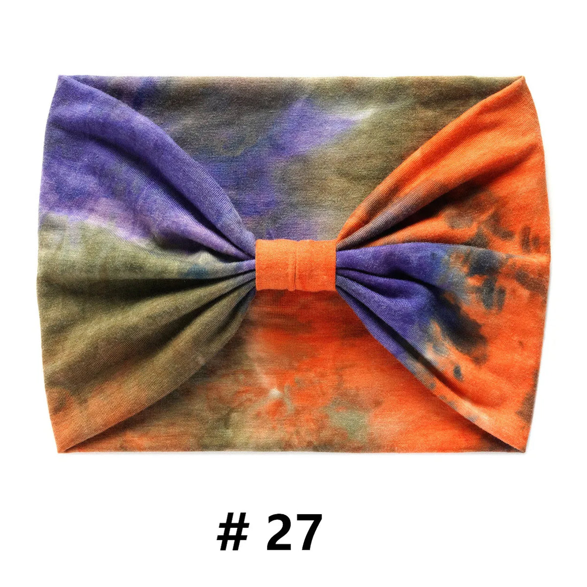 Bandeau en coton tie-dye aux tons de violet, vert et orange.