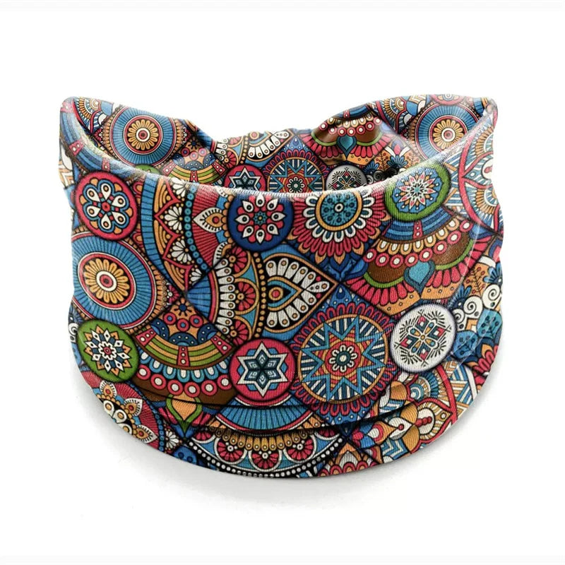 A colorful bohemian stretch cotton headband featuring intricate geometric and floral patterns.