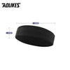 Black moisture-wicking athletic headband measuring 18cm long and 5cm high