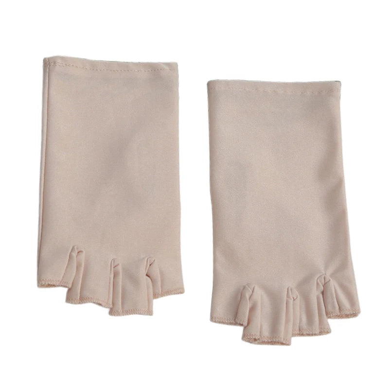 Pair of light beige thin stretch elastane gloves for driving and cycling