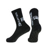 A pair of black men's athletic soccer socks with non-slip grip featuring white text and a stylized logo.